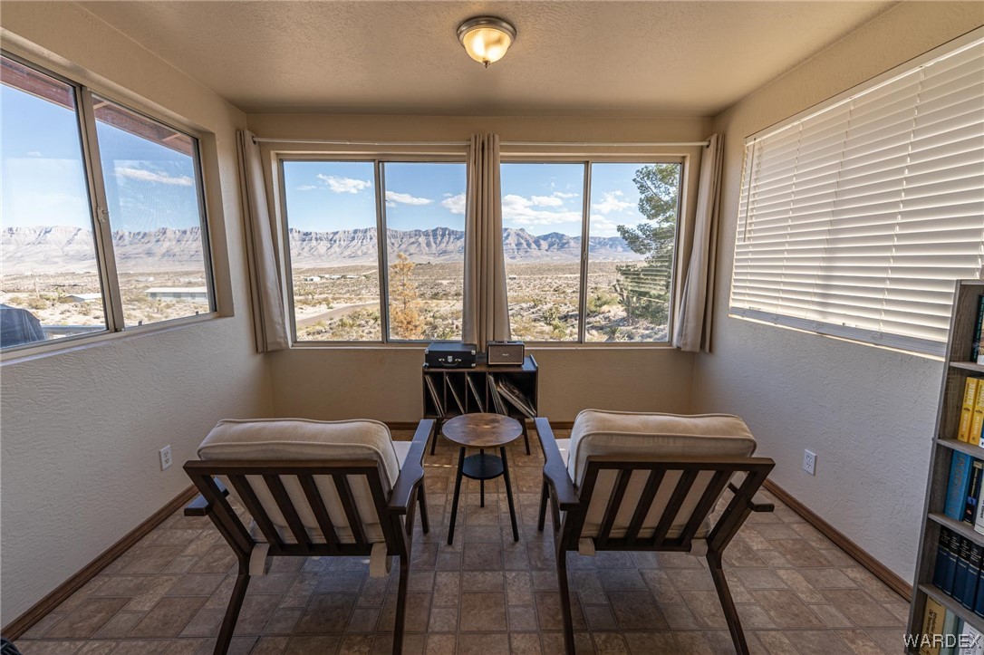 180 Sunfish Way Meadview, AZ 86444 - Photo 16 of 42 a view of a dining room with furniture and windows