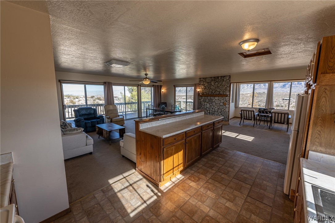 180 Sunfish Way Meadview, AZ 86444 - Photo 17 of 42 a kitchen with stainless steel appliances granite countertop lots of counter top space
