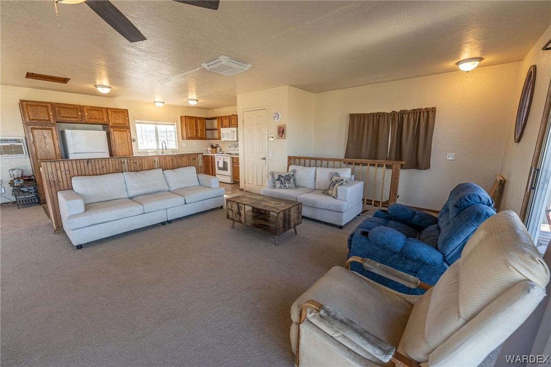 180 Sunfish Way Meadview, AZ 86444 - Photo 19 of 42 a living room with furniture and a couch