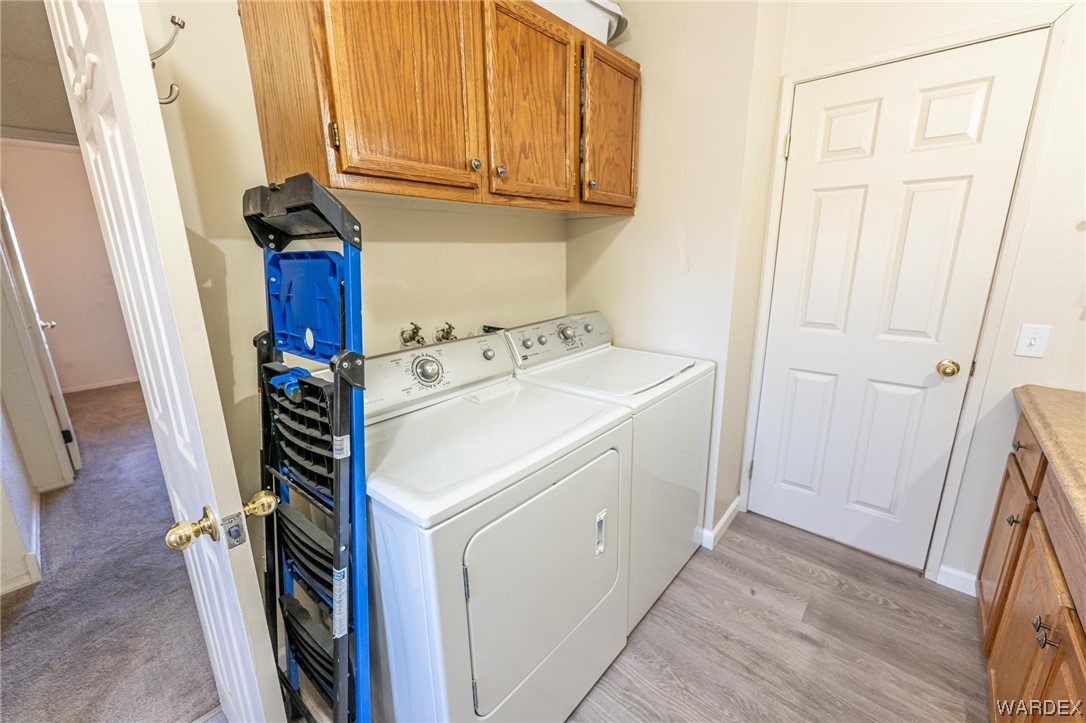 180 Sunfish Way Meadview, AZ 86444 - Photo 28 of 42 a utility room with dryer and washer