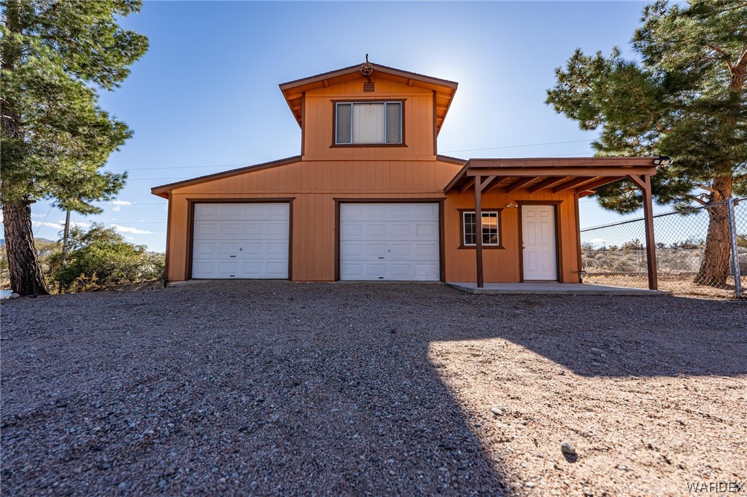 180 Sunfish Way Meadview, AZ 86444 - Photo 31 of 42 a front view of a house with a yard