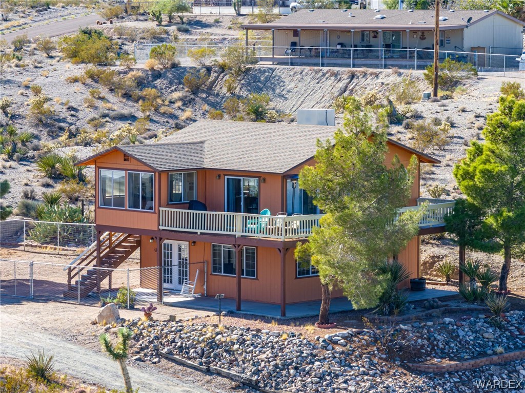180 Sunfish Way Meadview, AZ 86444 - Photo 4 of 42 a view of house with a garden