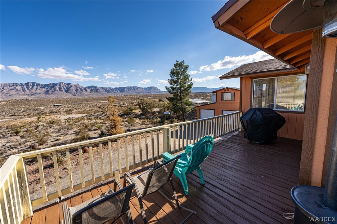 180 Sunfish Way Meadview, AZ 86444 - Photo 7 of 42 a view of balcony with wooden floor and seating space