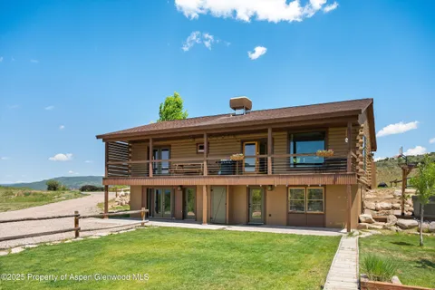 a front view of a house with a porch