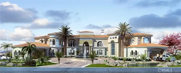 a front view of a houses with yard and green space