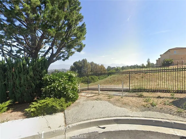 a view of a tennis court with a basket ball court