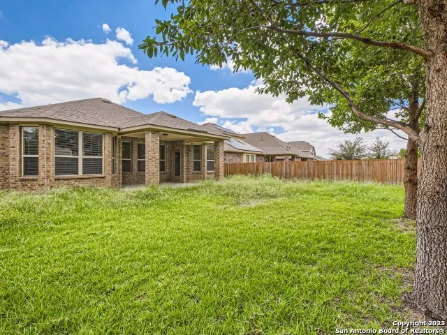 a view of a house with a garden