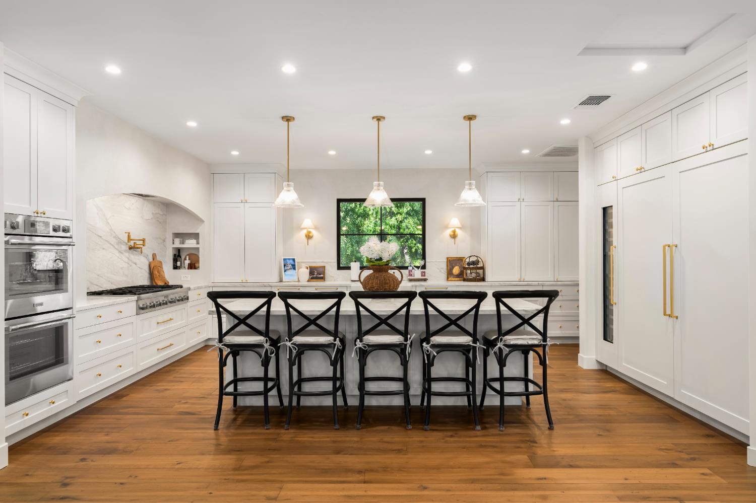 7697 Horseshoe Bar Road Loomis, CA 95650 - Photo 9 of 76 a view of a dining room with furniture and wooden floor