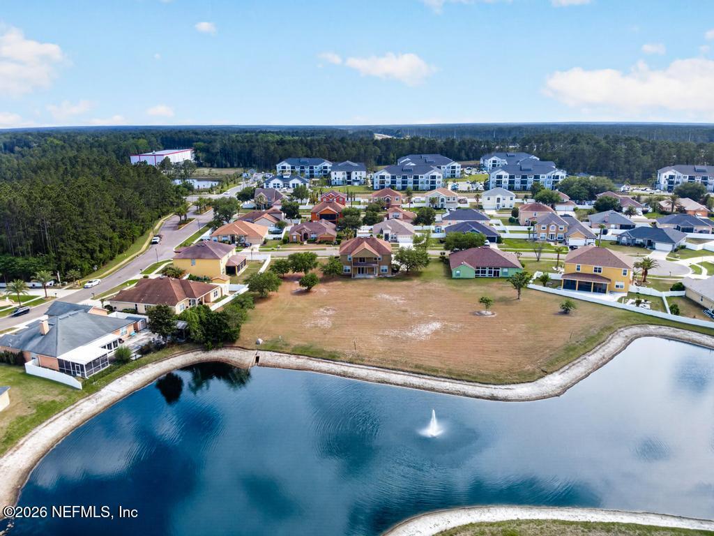 10917 Dancing Rabbit Lane Jacksonville, FL 32210 - Photo 106 of 121 Dancing Rabbit Ln Aerial Pond 3