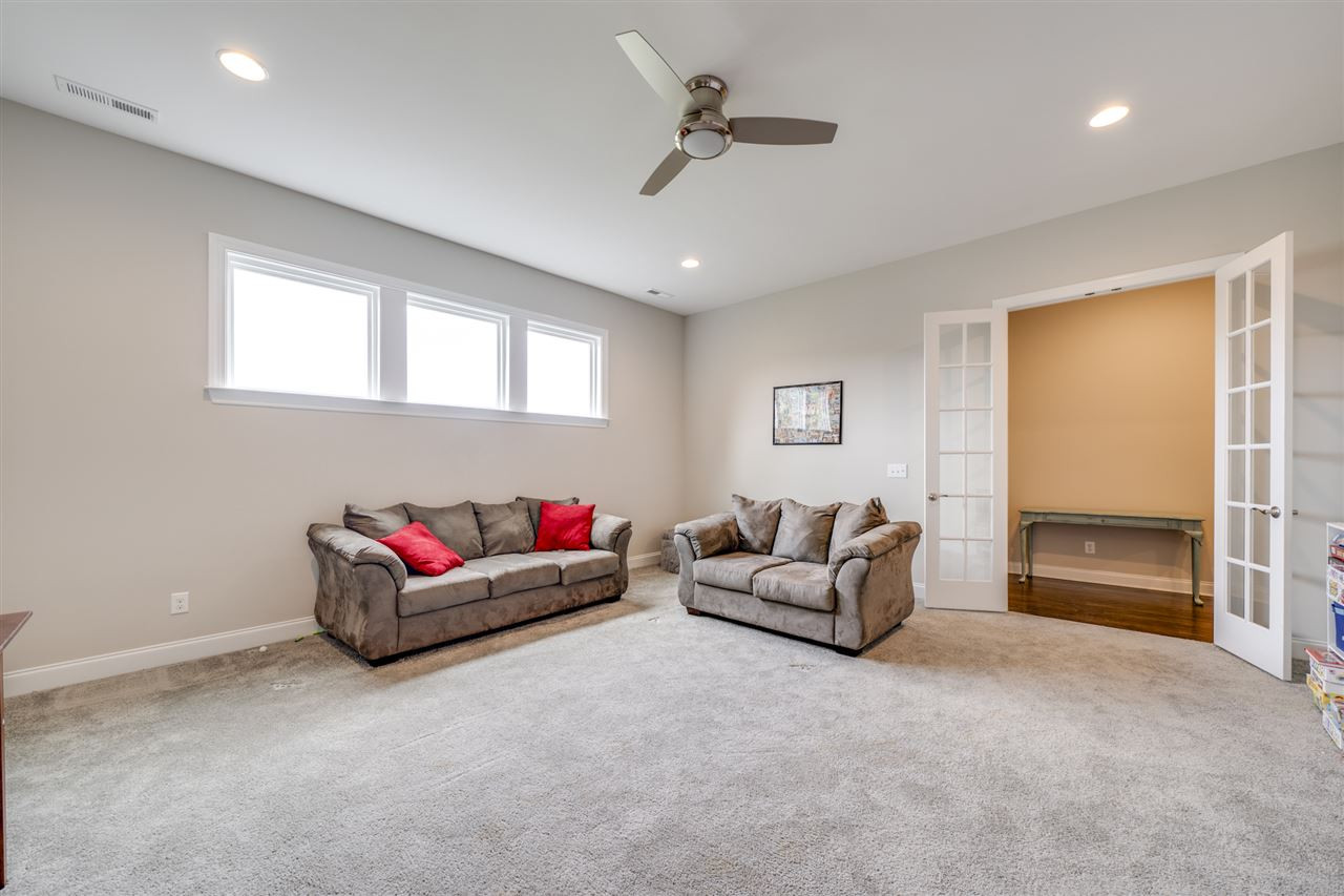 7504 Pinaster Place Raleigh, NC 27613 - Photo 17 of 30 2nd floor - Spacious, perfect lounge for the secondary bedrooms! Bonus Room