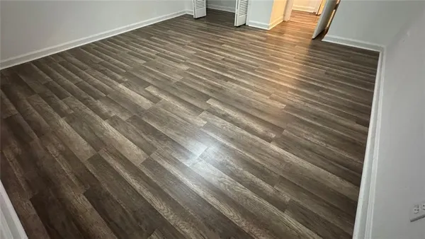 a view of backyard with wooden floor