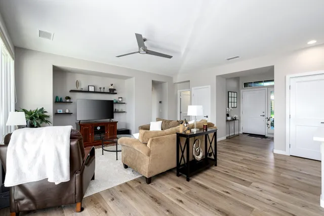 a kitchen with a refrigerator stove and sink