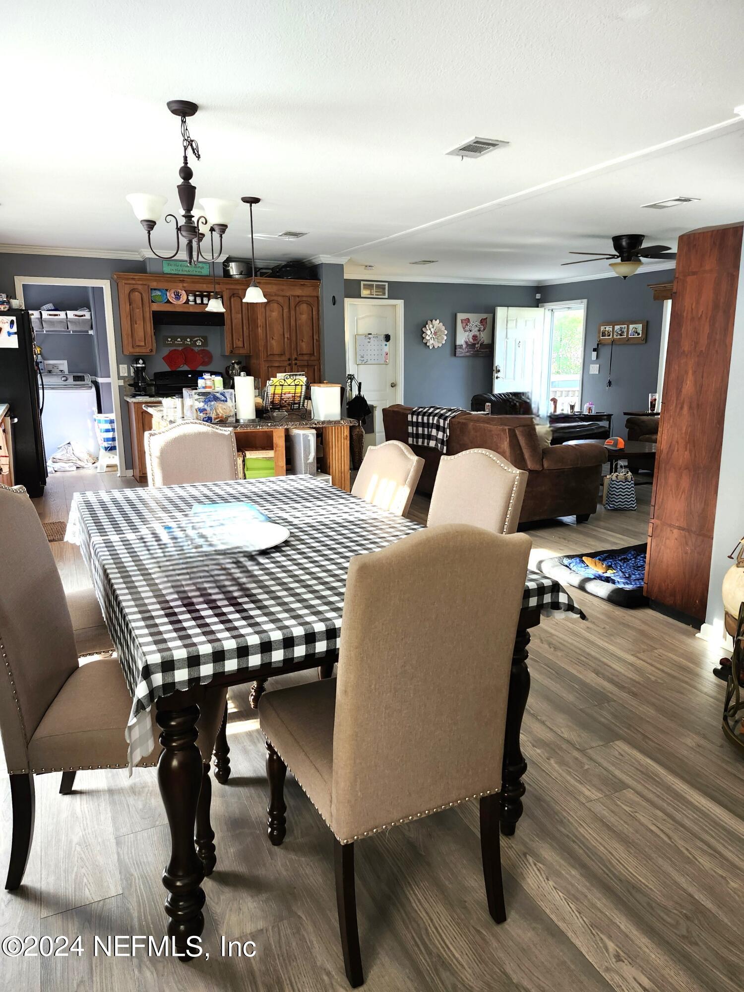 12848 Yellow Bluff Road Jacksonville, FL 32226 - Photo 16 of 30 Dining & kitchen & Living room from Fami