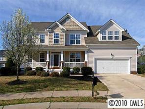4726 Lapis Court Fort Mill, SC 29708 - Photo 1 of 8 a front view of a house with garden