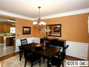 4726 Lapis Court Fort Mill, SC 29708 - Photo 2 of 8 a view of a dining room with furniture window and wooden floor