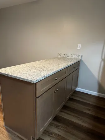 a bathroom with a sink and vanity