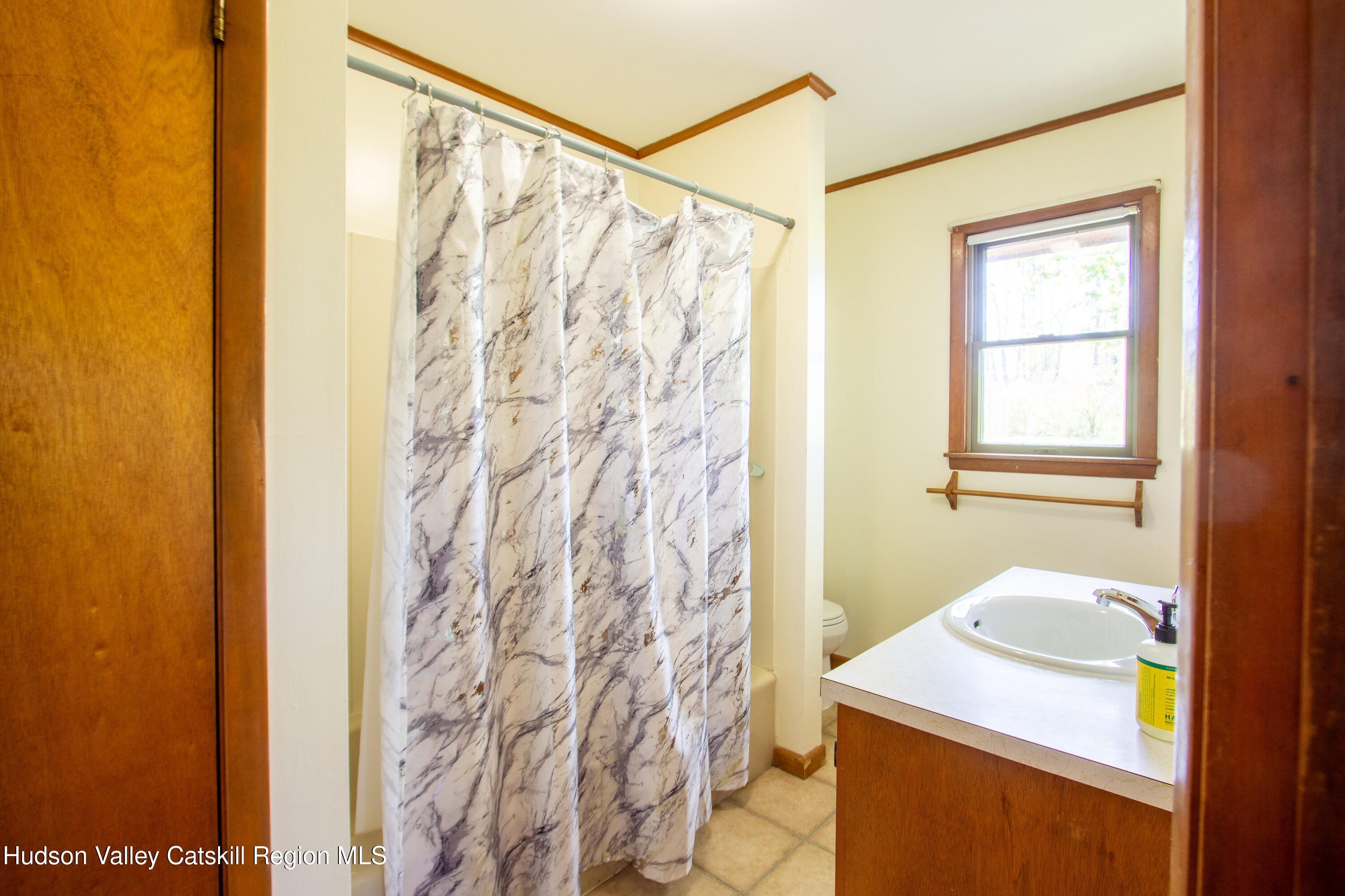 205 Fordham Road Valatie, NY 12184 - Photo 15 of 18 a bathroom with a sink and a mirror