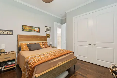 a bedroom with a bed and a view of bathroom