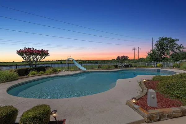 a view of a lake with a outdoor space