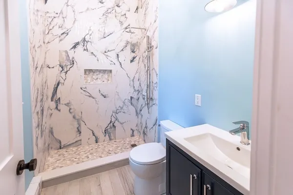 a bathroom with a sink and a toilet