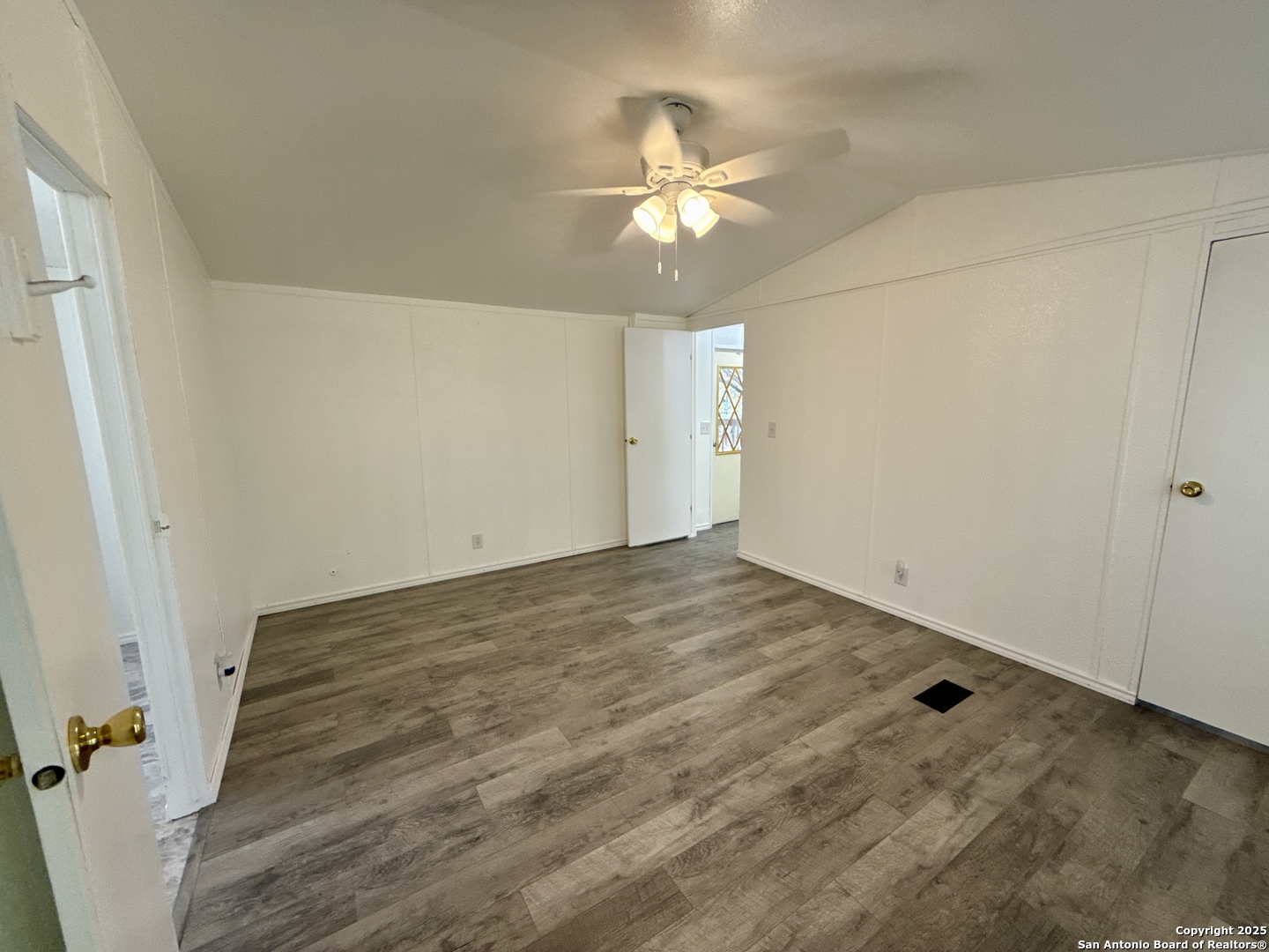 300 Pecos Road Bandera, TX 78003 - Photo 13 of 44 wooden floor in an empty room