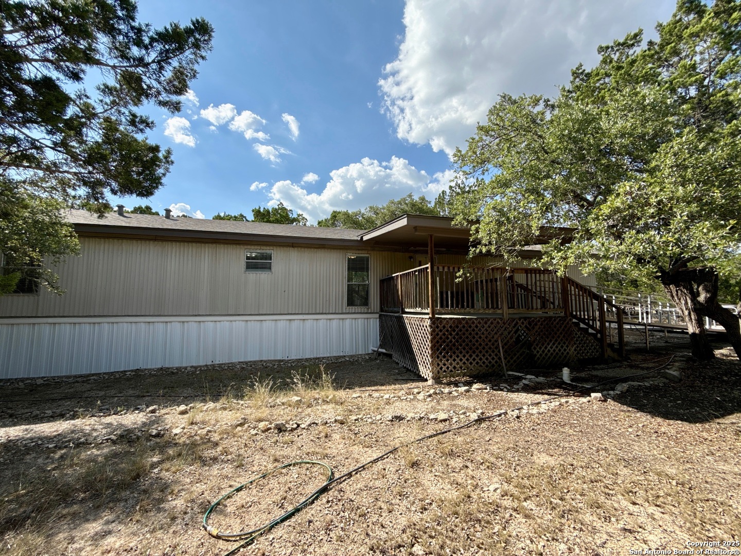 300 Pecos Road Bandera, TX 78003 - Photo 27 of 44 a view of a house with a yard