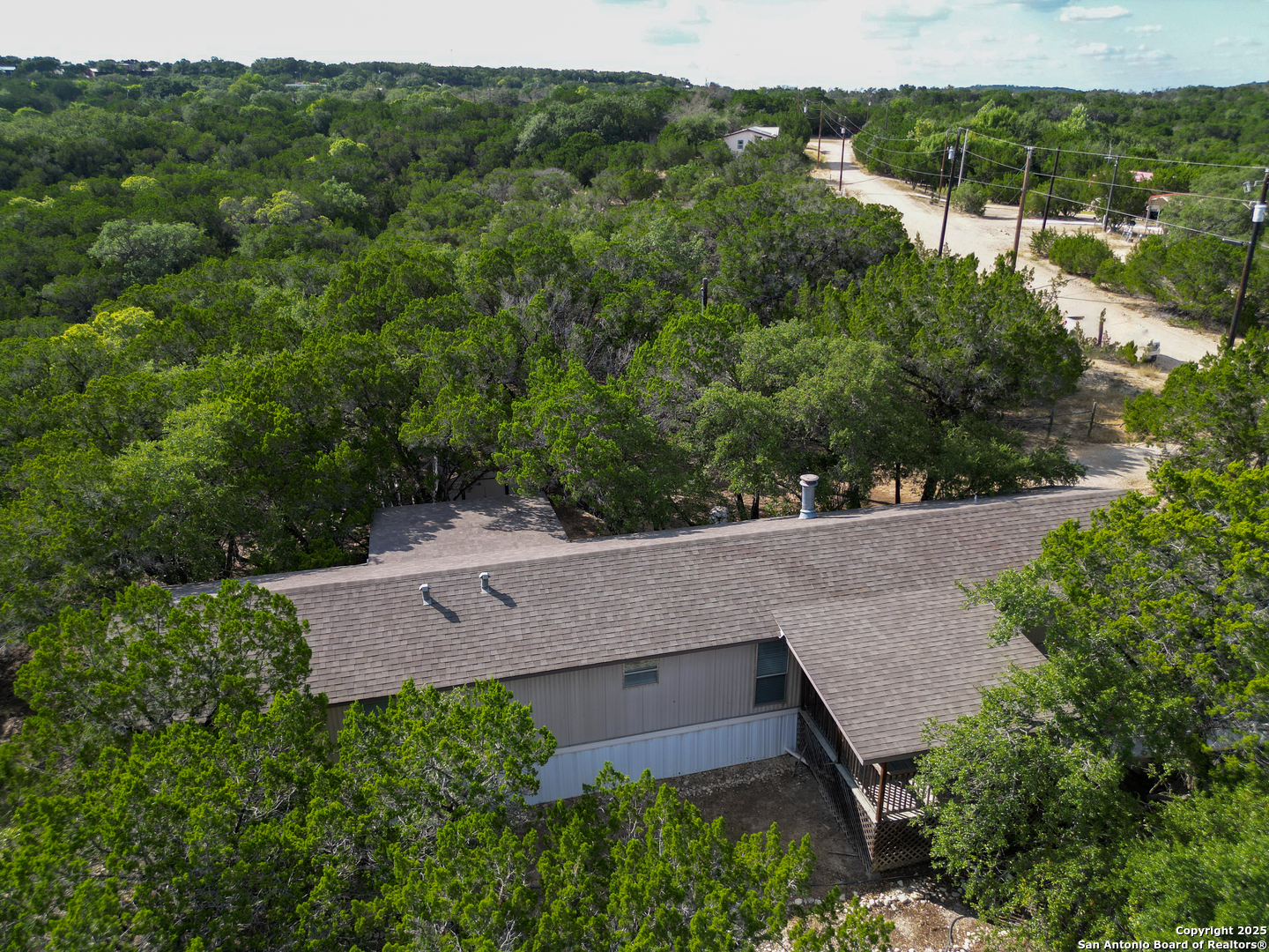 300 Pecos Road Bandera, TX 78003 - Photo 34 of 44 an aerial view of a house with a yard