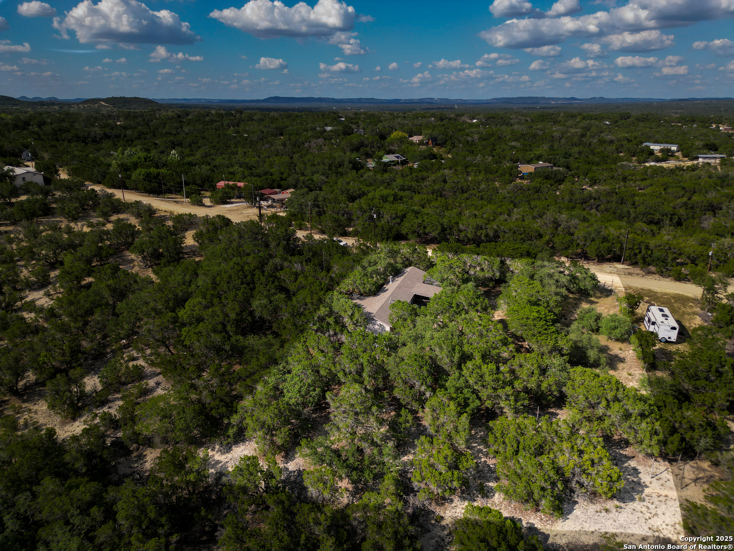 300 Pecos Road Bandera, TX 78003 - Photo 35 of 44 a view of a houses with a yard