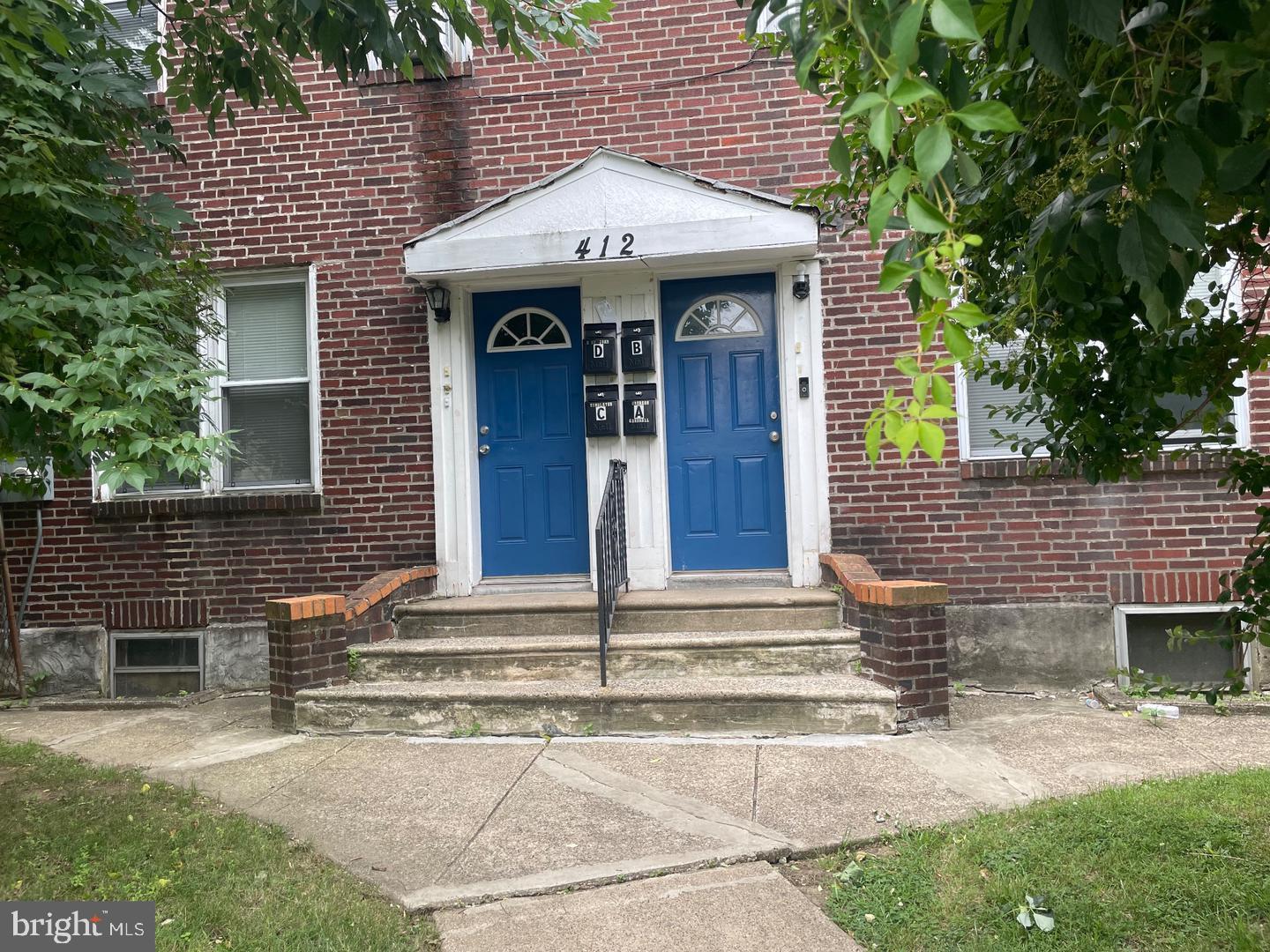 412 East Walnut Lane, Unit 4D Philadelphia, PA 19144 - Photo 1 of 4 Charming brick duplex entrance.