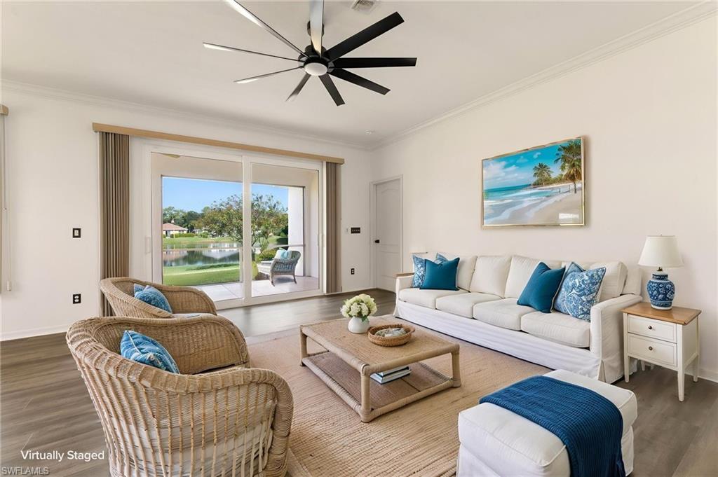 223 Stanhope Circle Naples, FL 34104 - Photo 38 of 41 Spacious interior with wood-finish flooring and a contemporary ceiling fan