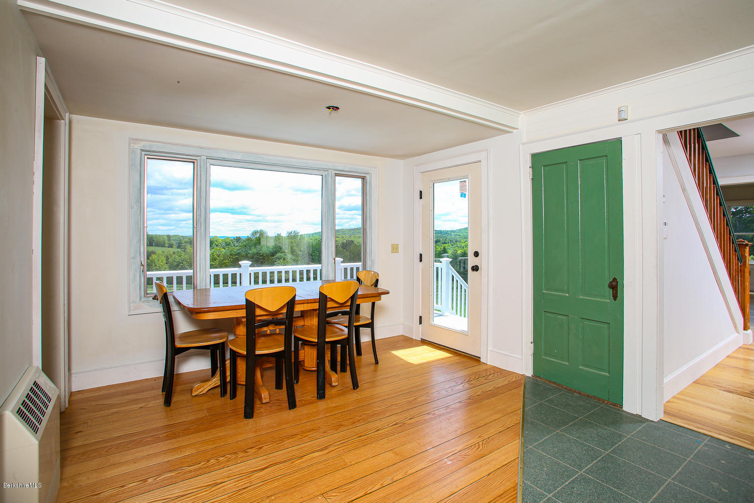 837 Murray Road Ashfield, MA 01330 - Photo 7 of 37 a dining room with furniture window and wooden floor