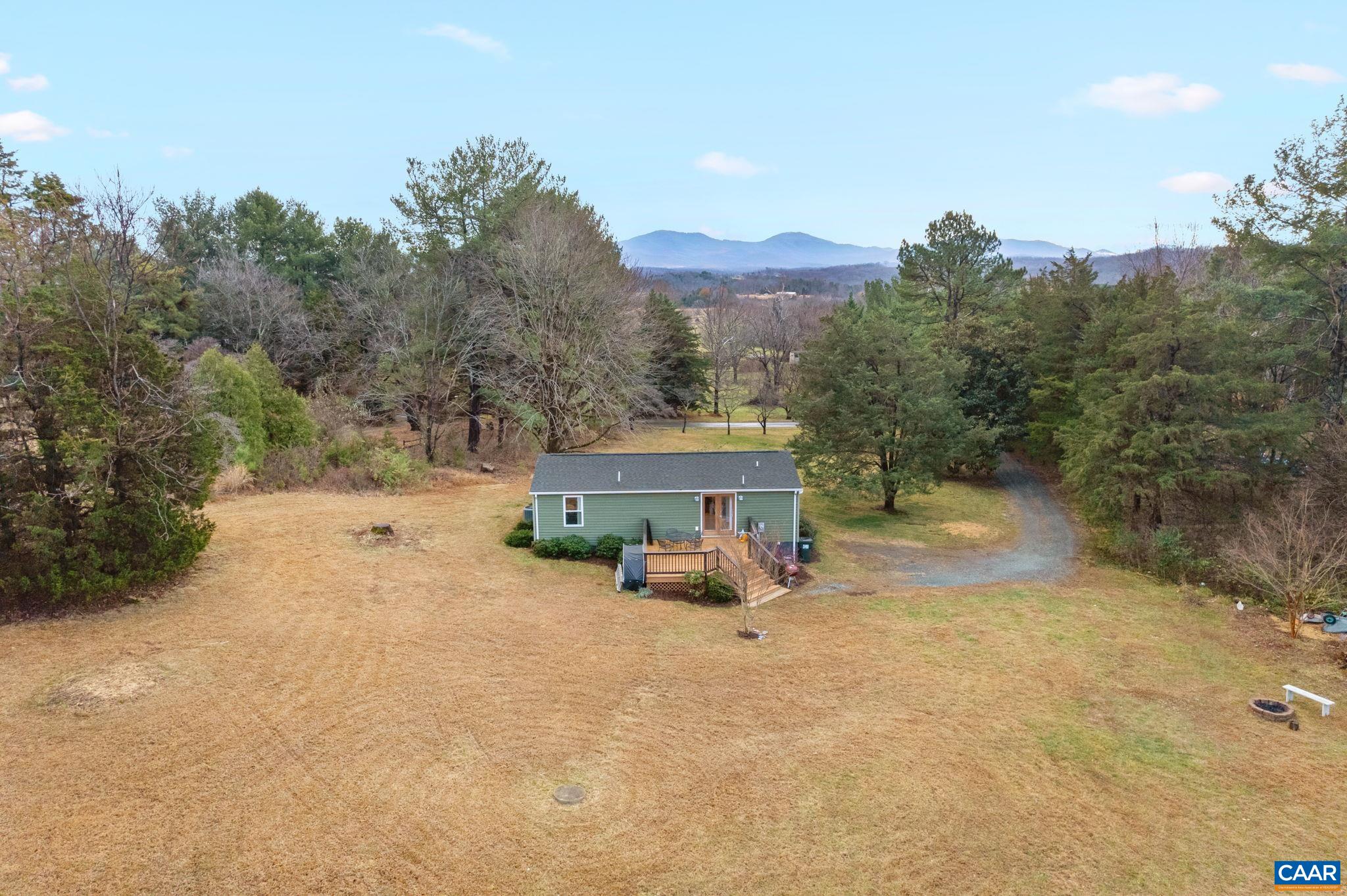 504 Newtown Road Greenwood, VA 22943 - Photo 28 of 34 an aerial view of a house with a yard and sitting area