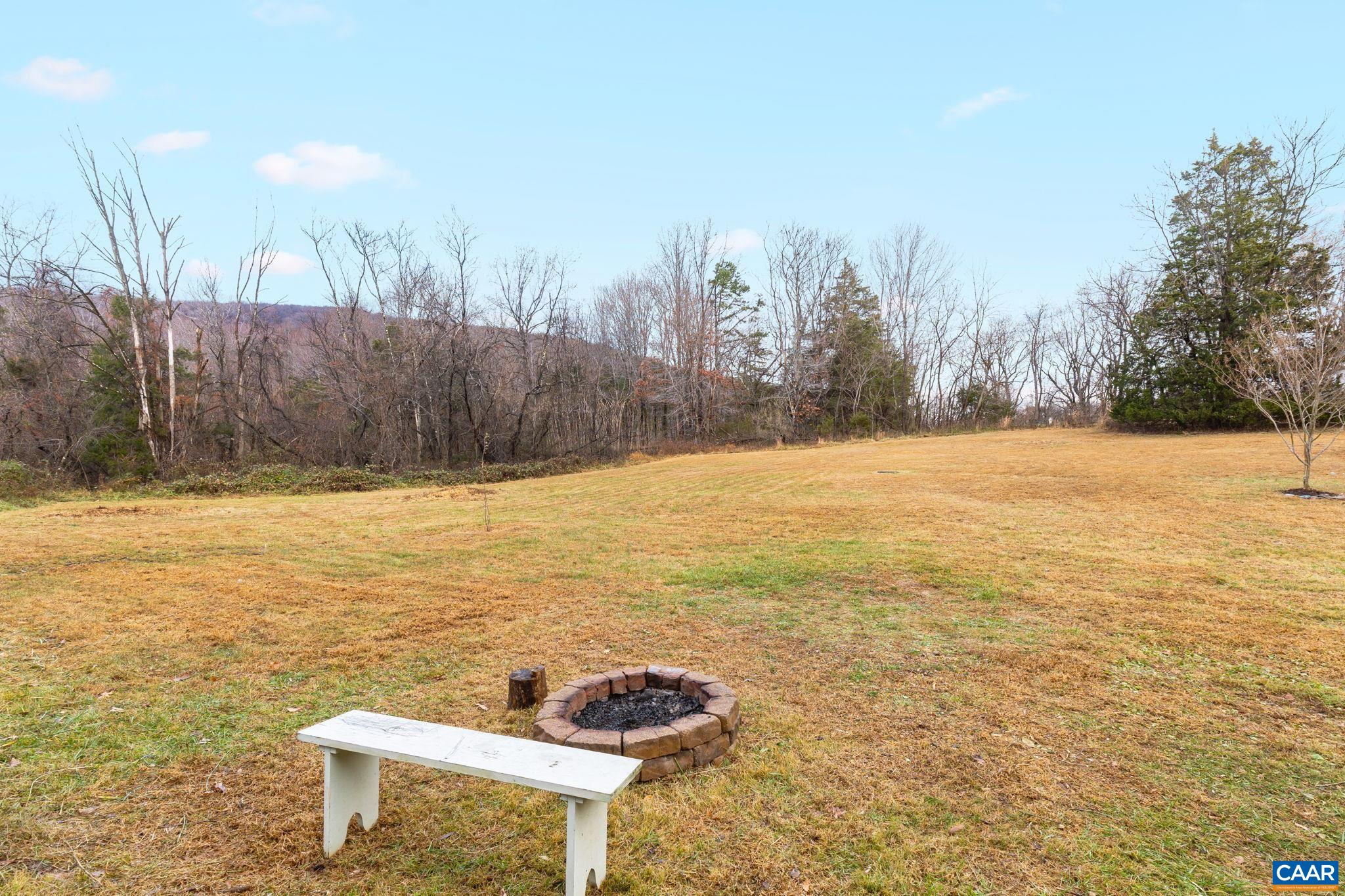 504 Newtown Road Greenwood, VA 22943 - Photo 5 of 34 a view of a swimming pool and an outdoor space
