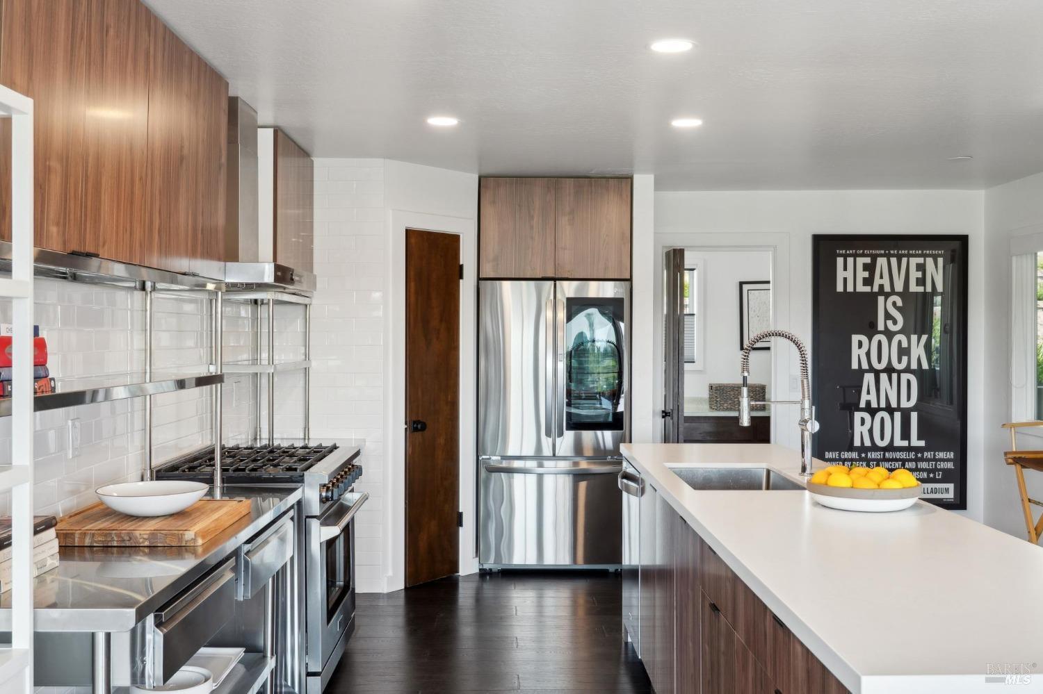 3485 Ridgeview Drive Santa Rosa, CA 95404 - Photo 16 of 63 a kitchen with stainless steel appliances granite countertop a refrigerator a stove and a sink with wooden floor