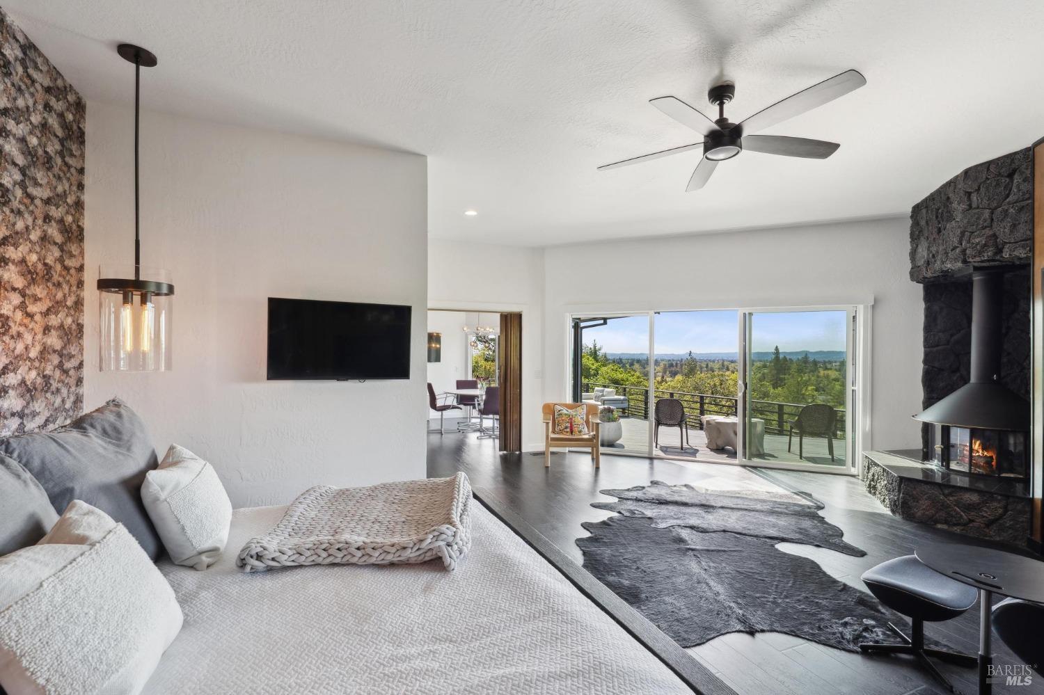 3485 Ridgeview Drive Santa Rosa, CA 95404 - Photo 27 of 63 a living room with furniture and a flat screen tv
