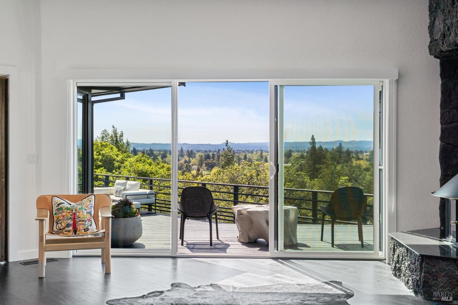 3485 Ridgeview Drive Santa Rosa, CA 95404 - Photo 28 of 63 a living room with furniture and a floor to ceiling window