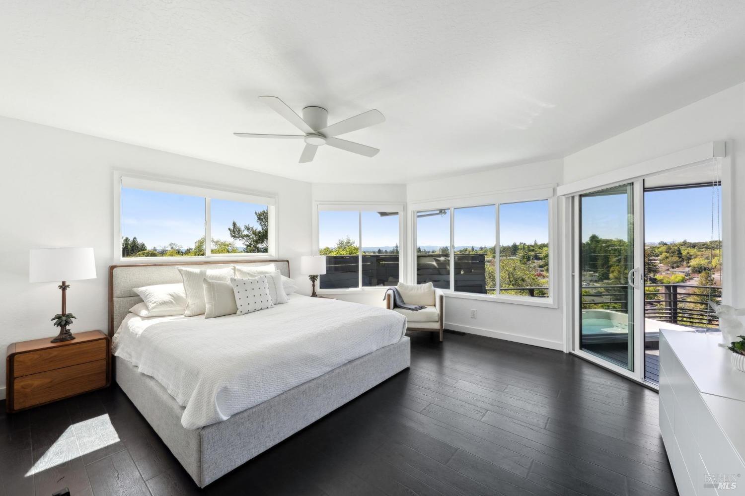 3485 Ridgeview Drive Santa Rosa, CA 95404 - Photo 30 of 63 a bedroom with a large bed and a large window