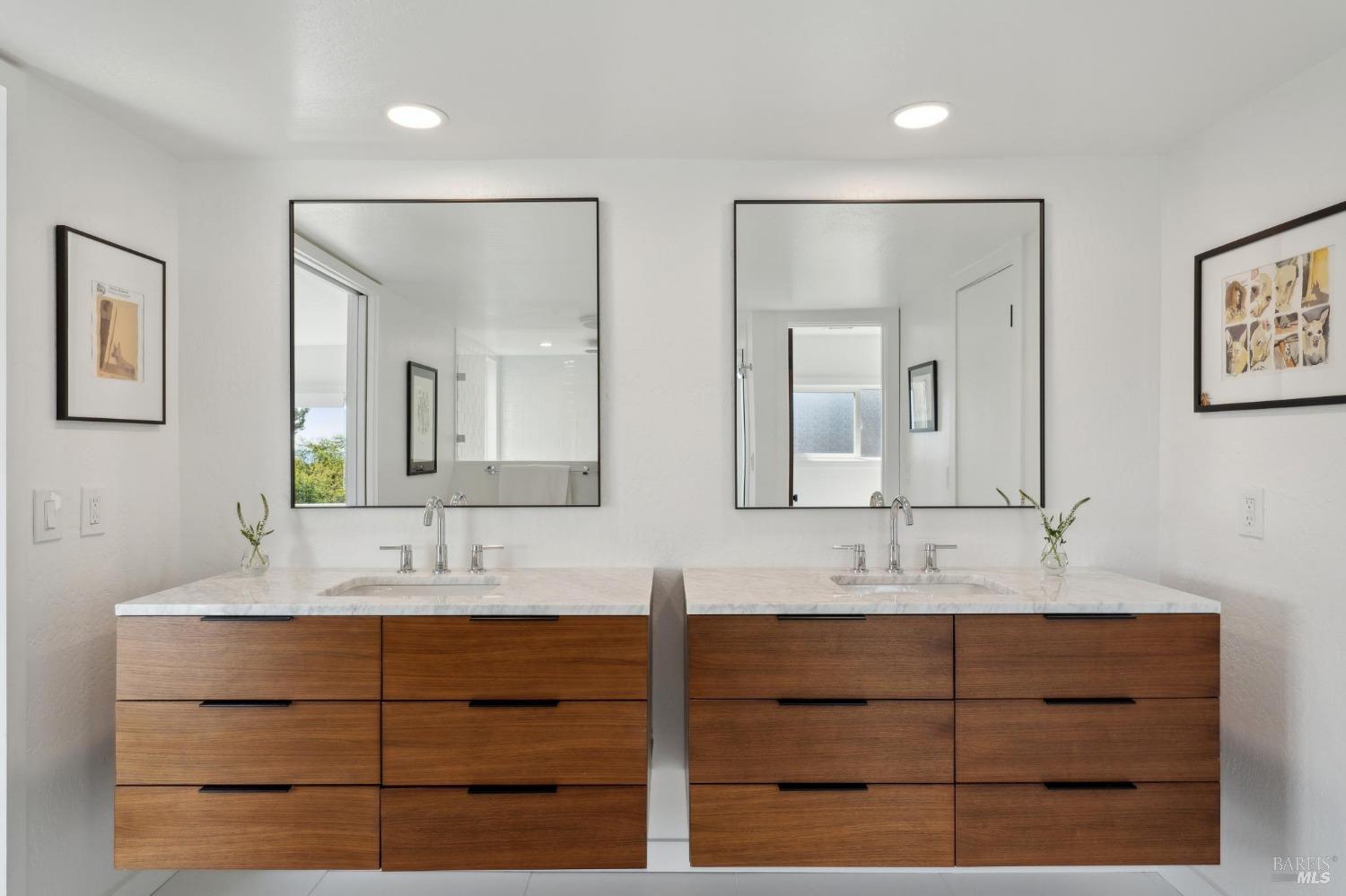 3485 Ridgeview Drive Santa Rosa, CA 95404 - Photo 35 of 63 a bathroom with double vanity sinks and a mirror