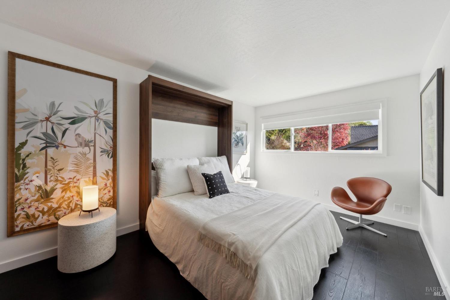 3485 Ridgeview Drive Santa Rosa, CA 95404 - Photo 37 of 63 a bedroom with a bed and a painting on the wall