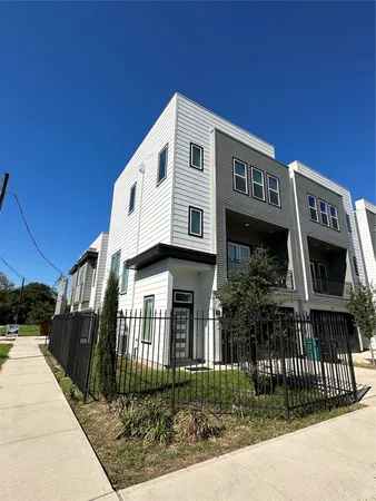 a front view of a house with glass windows
