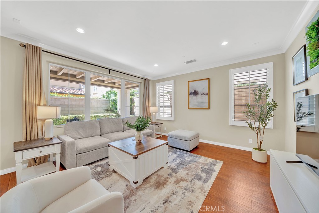 75 Gardenstone Path Irvine, CA 92620 - Photo 4 of 65 a living room with furniture and a large window