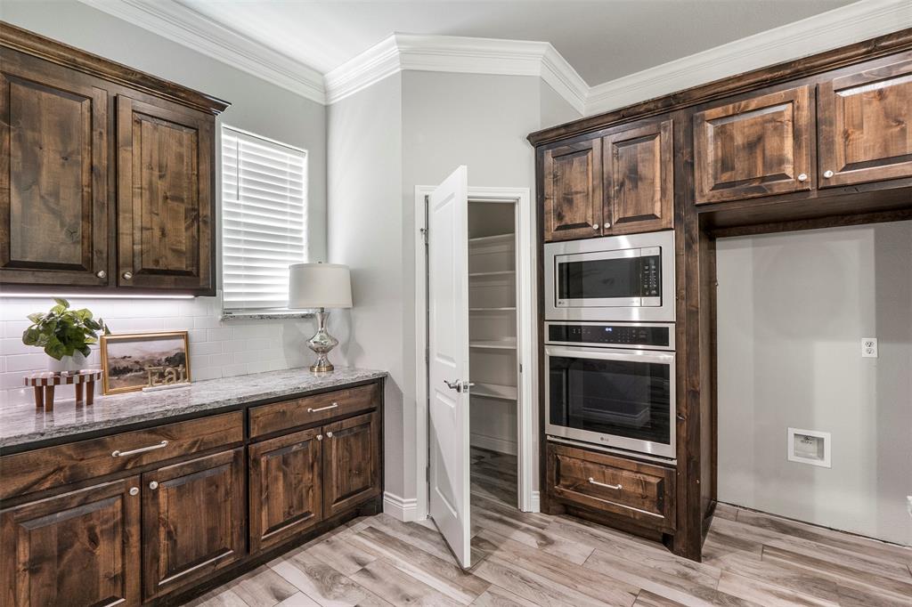 10301 Ravenswood Road Granbury, TX 76049 - Photo 12 of 38 Extra counter space near pantry