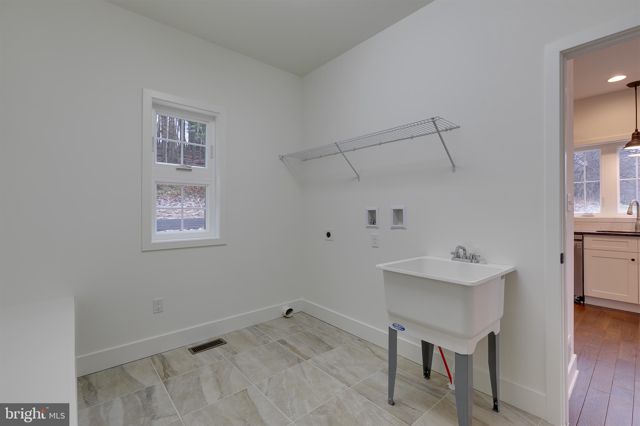 5403 Buffalo Road Mount Airy, MD 21771 - Photo 14 of 31 Tiled Floor In Laundry/Mud Room