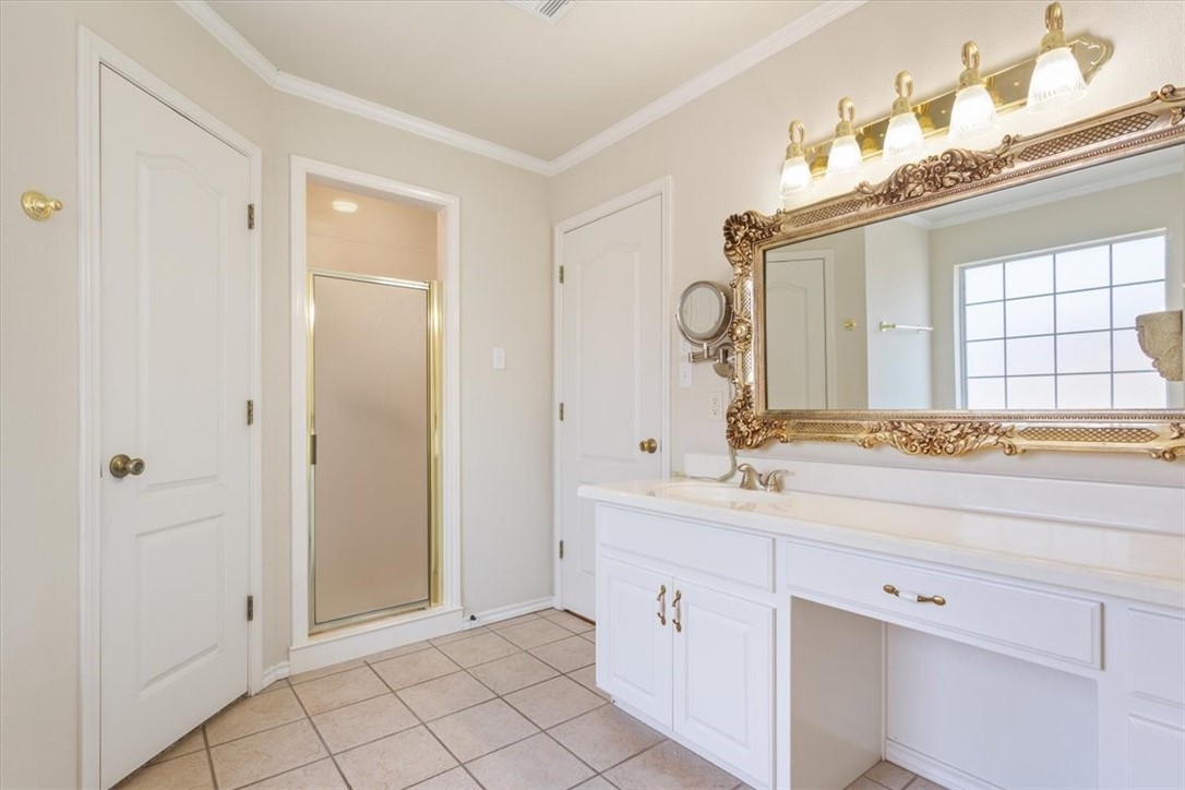 306 Baker Lane Robinson, TX 76706 - Photo 18 of 28 a bathroom with a sink and a mirror