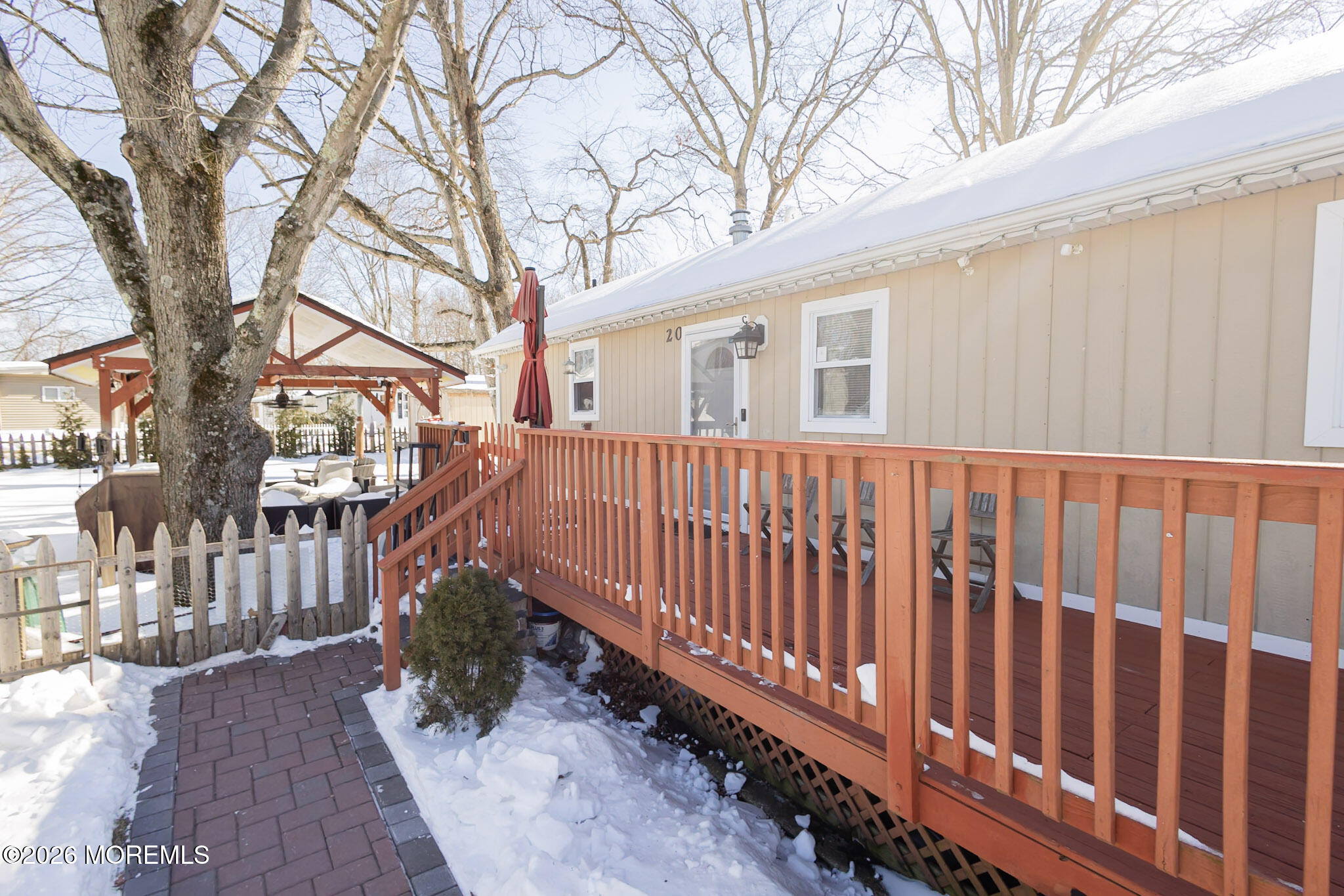 20 Grace Lane Howell, NJ 07731 - Photo 18 of 20 a view of a house with wooden fence