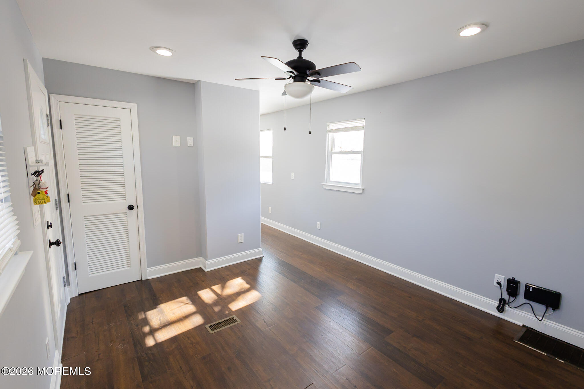 20 Grace Lane Howell, NJ 07731 - Photo 5 of 20 wooden floor in an empty room with a window
