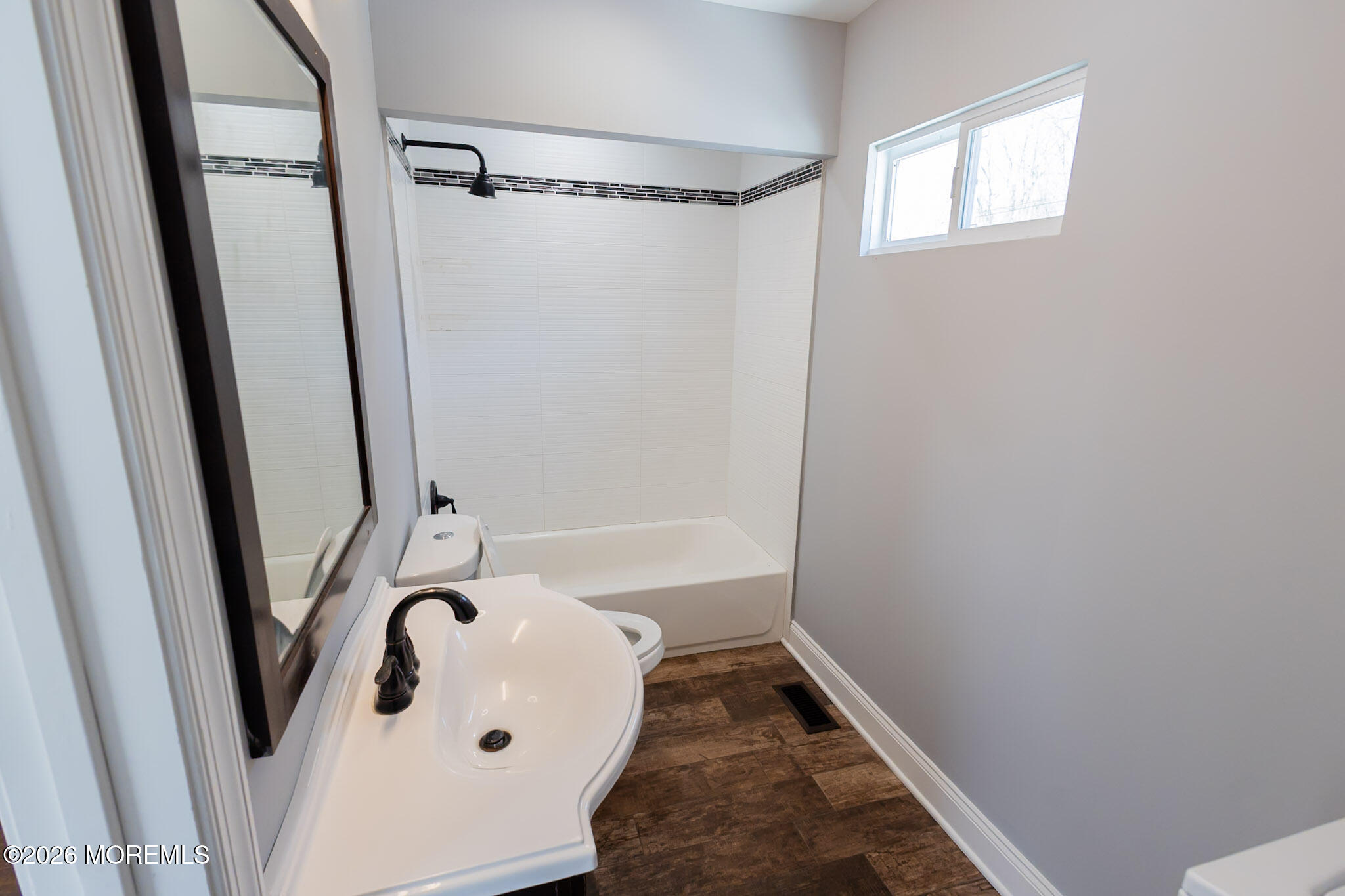 20 Grace Lane Howell, NJ 07731 - Photo 8 of 20 a bathroom with a bathtub and a shower