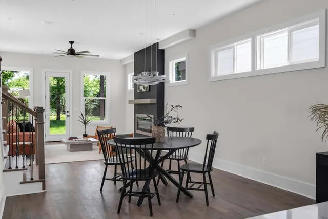 a view of a dining room with furniture window and outside view