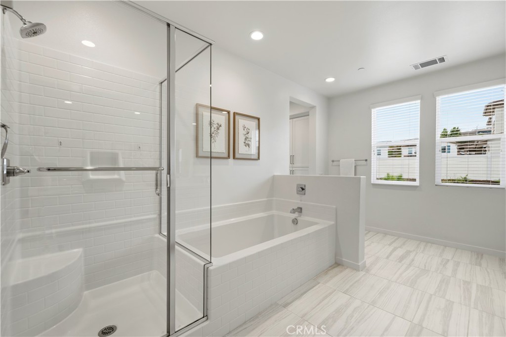18135 Tableau Way Saugus, CA 91350 - Photo 29 of 43 soaking tub and walk in shower
