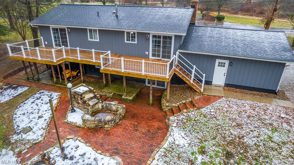 2729 Mayfair Road Akron, OH 44312 - Photo 22 of 30 Rear view of property featuring a deck